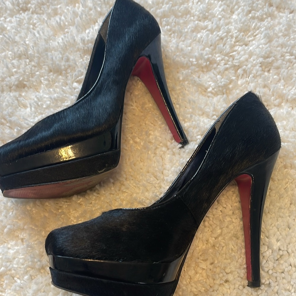 Paris Hilton pony-haired black pumps. Worn 2-3 times.